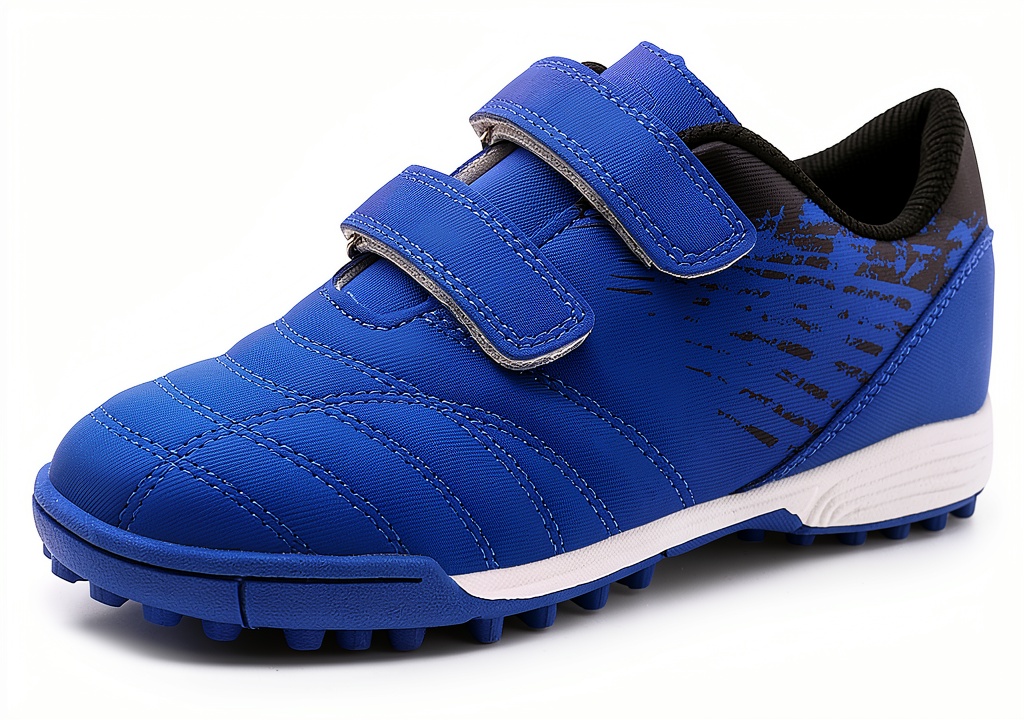 Nike Girls Soccer Shoes synthetic material on a child's foot in a backyard